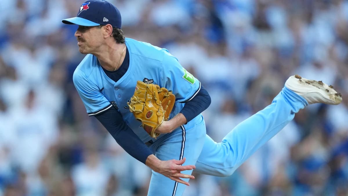 Toronto Blue Jays pitcher Shane Bieber (57) pitches against the Los Angeles Dodgers in the first inning during game four of the 2025 MLB World Series at Dodger Stadium.