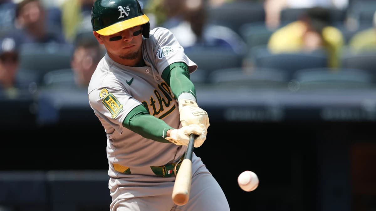 Athletics second base Luis Urias (17) singles during the fifth inning against the New York Yankees at Yankee Stadium.