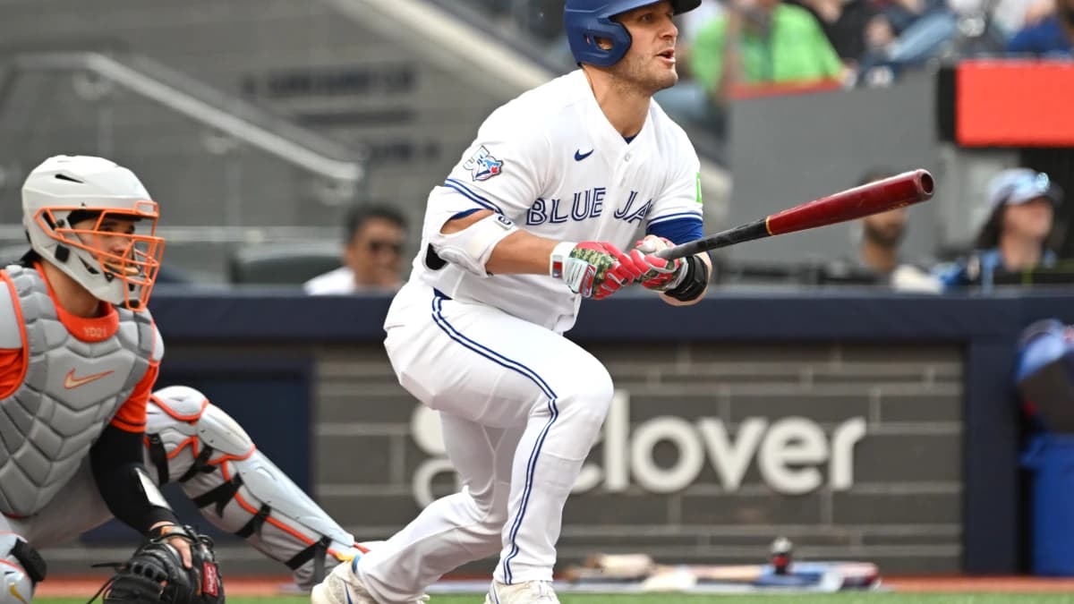 Toronto Blue Jays center fielder Daulton Varsho (5) hits a double against the Houston Astros in the fifth inning at Rogers Centre.