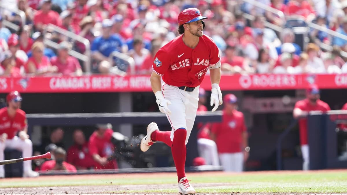 Toronto Blue Jays second baseman Ernie Clement (22) reacts after hitting a RBI double against the New York Mets during the third inning at Rogers Centr