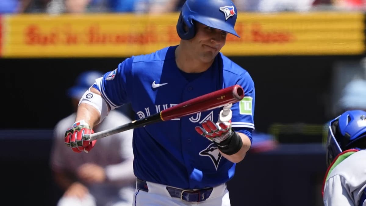 Toronto Blue Jays center fielder Daulton Varsho (5) reacts after striking out during the first inning with men on base against the Texas Rangers at Rogers Centre.