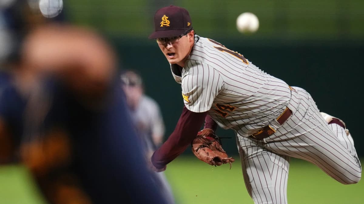 ASU Sun Devils left-hander Cole Carlon (14) pitches against the West Virginia Mountaineers during their Big 12 tournament game at Surprise Stadium on May 22, 2026.
