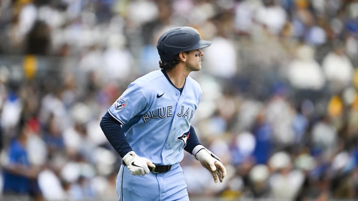 Toronto Blue Jays second baseman Ernie Clement (22) flips his bat after hitting two-run home run during the fourth inning against the San Diego Padres at Petco Park.