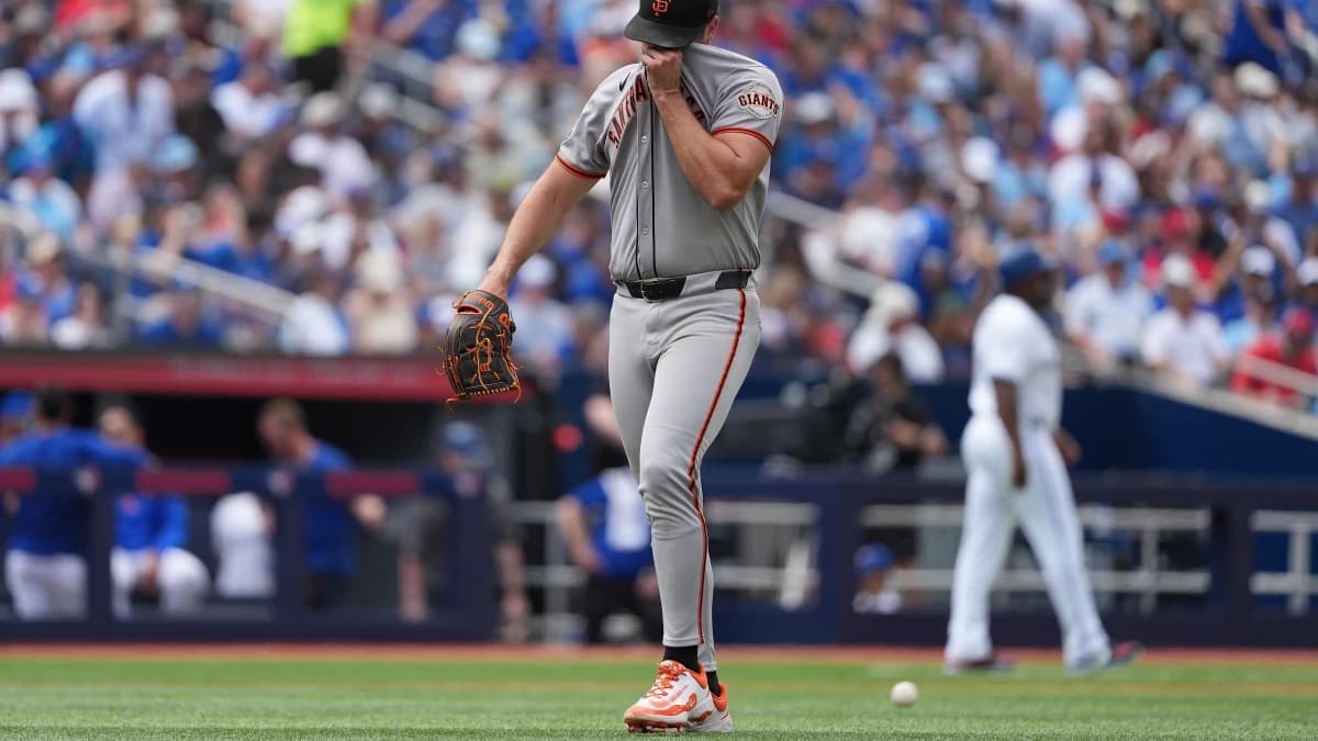 San Francisco Giants starting pitcher Robbie Ray (38) walks towards the dugout against the Toronto Blue Jays during the fourth inning at Rogers Centre.