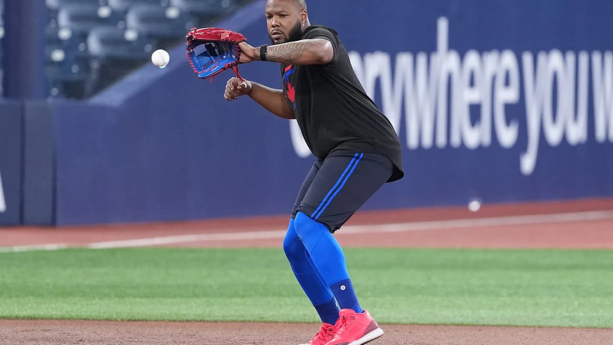Toronto Blue Jays first baseman Vladimir Guerrero Jr. (27) fields balls during batting practice before a game against the Chicago White Sox at Rogers Centre.