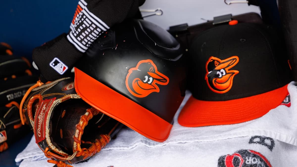 Baltimore Orioles helmets in the dugout prior to the game against the Kansas City Royals at Kauffman Stadium.