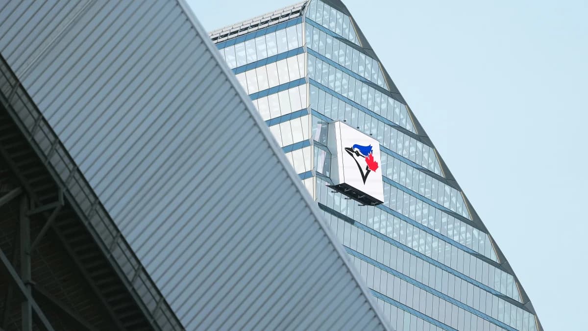 The Toronto Dominion Bank Building displays the Toronto Blue Jays logo against the New York Yankees during the eighth inning in game one of the ALDS round for the 2025 MLB playoffs at Rogers Centre.
