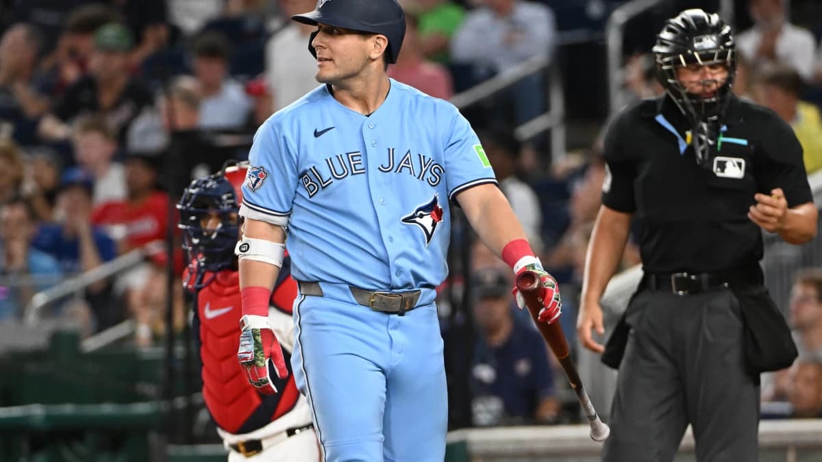 Toronto Blue Jays center fielder Daulton Varsho (5) reacts after striking out against the Washington Nationals during the second inning at Nationals Park.