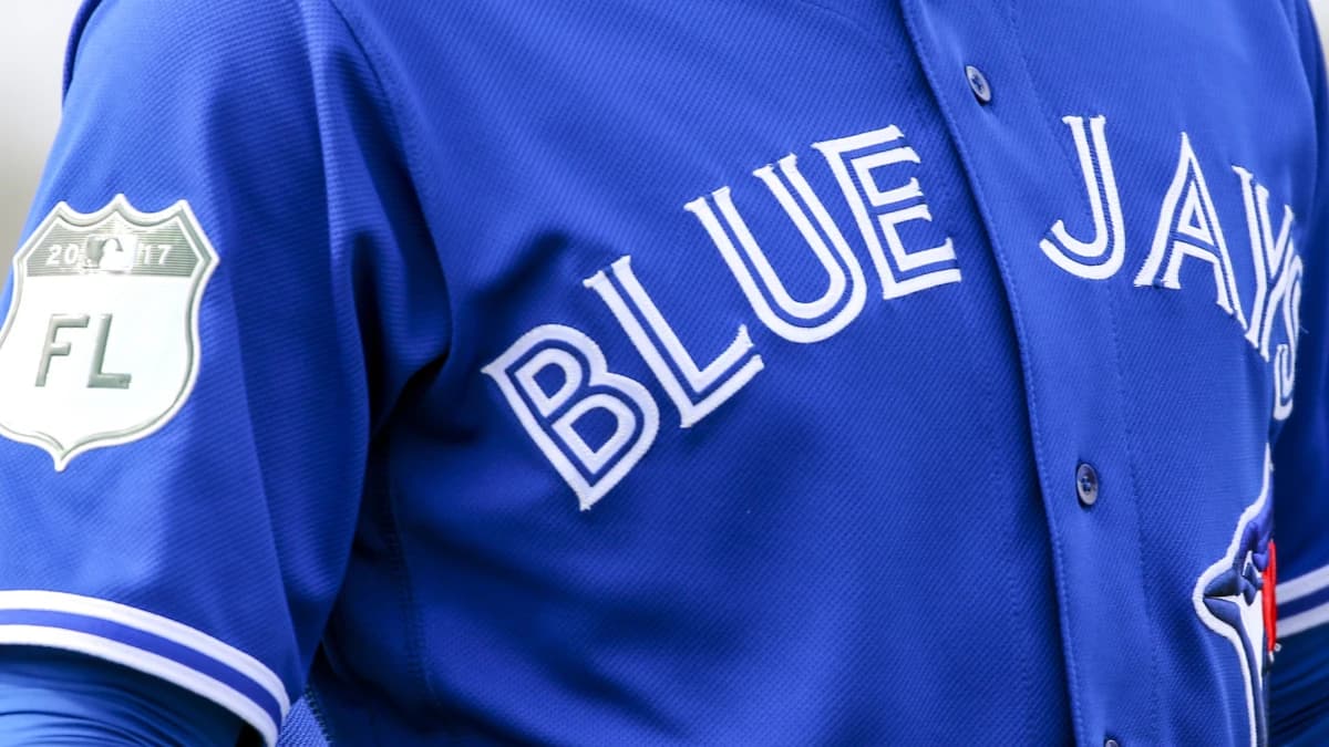 Toronto Blue Jays right fielder Jose Bautista (19) jersey as he stretches during spring training at Bobby Mattick Training Center.