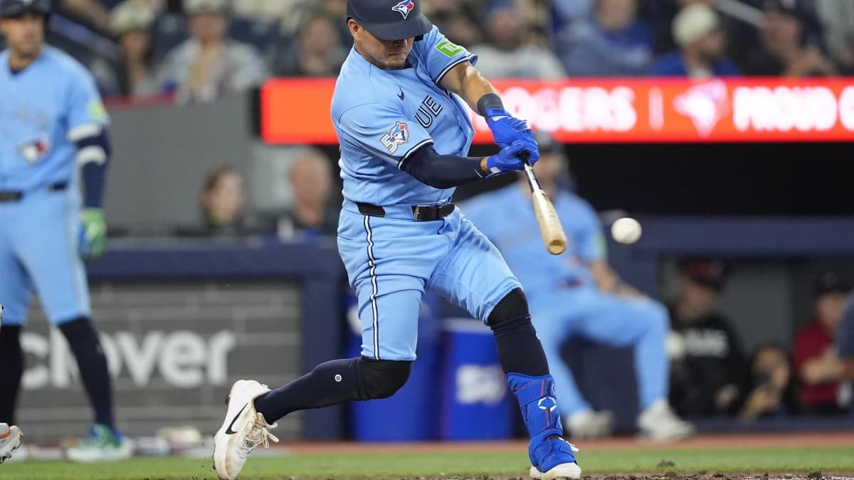 Toronto Blue Jays second baseman Luis Urias (48) hits a single against the Houston Astros during the eighth inning at Rogers Centre.