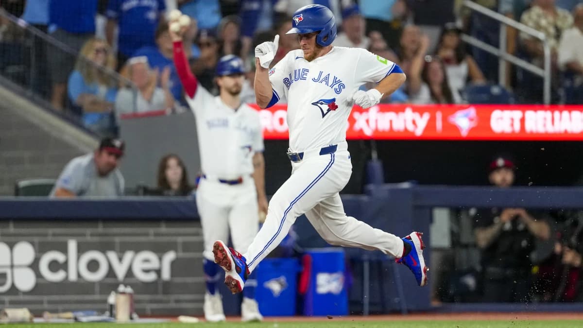 Toronto Blue Jays right fielder Myles Straw (3) scores against the Boston Red Sox during the fifth inning at Rogers Centre.