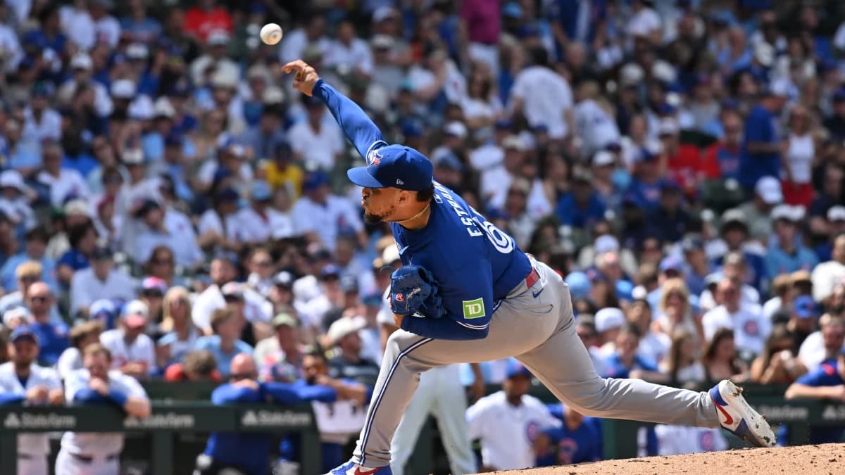 Toronto Blue Jays pitcher Lazaro Estrada (60) pitches against the Chicago Cubs during the sixth inning at Wrigley Field.