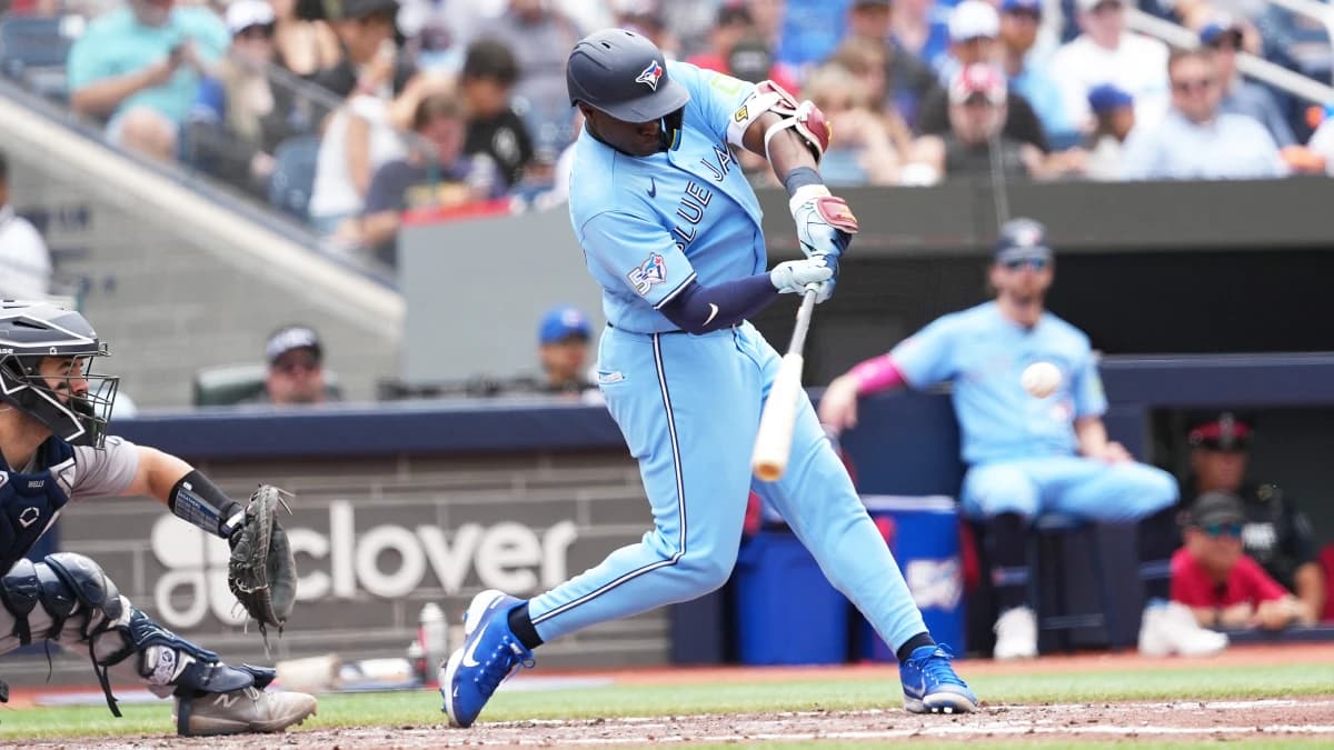 Toronto Blue Jays left fielder Daz Cameron (23) hits a RBI double against the New York Yankees during the fifth inning at Rogers Centre.