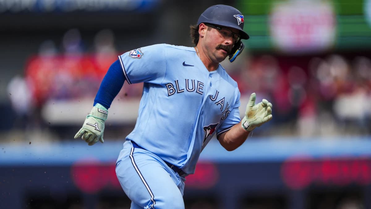 Toronto Blue Jays left fielder Davis Schneider (36) runs to third base during the third inning against the St. Louis Cardinals at Rogers Centre.