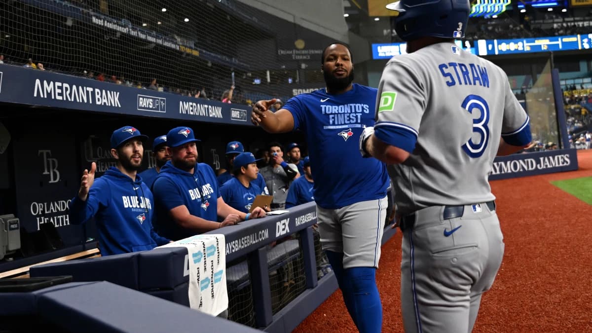 Toronto Blue Jays pinch hitter Myles Straw (3) is greeted bye infielder Vladimir Guerrero Jr. (27) after scoring a run in the fifth inning against the Tampa Bay Rays at Tropicana Field.