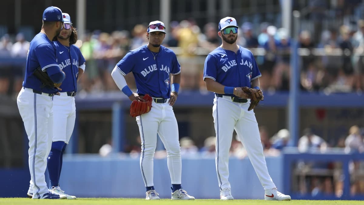 Toronto Blue Jays third baseman Isiah Kiner-Falefa (7) shortstop Bo Bichette (11) second baseman Santiago Espinal (5) and first baseman Spencer Horwitz (48) wait for a pitching change against the New York Yankees in the first inning at TD Ballpark.