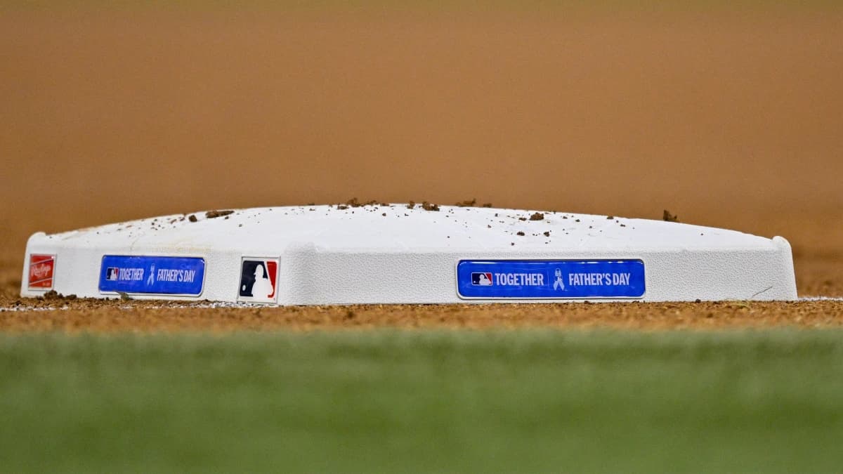 A view of the Father's Day logo on first base during the game between the Texas Rangers and the San Diego Padres at Globe Life Field.