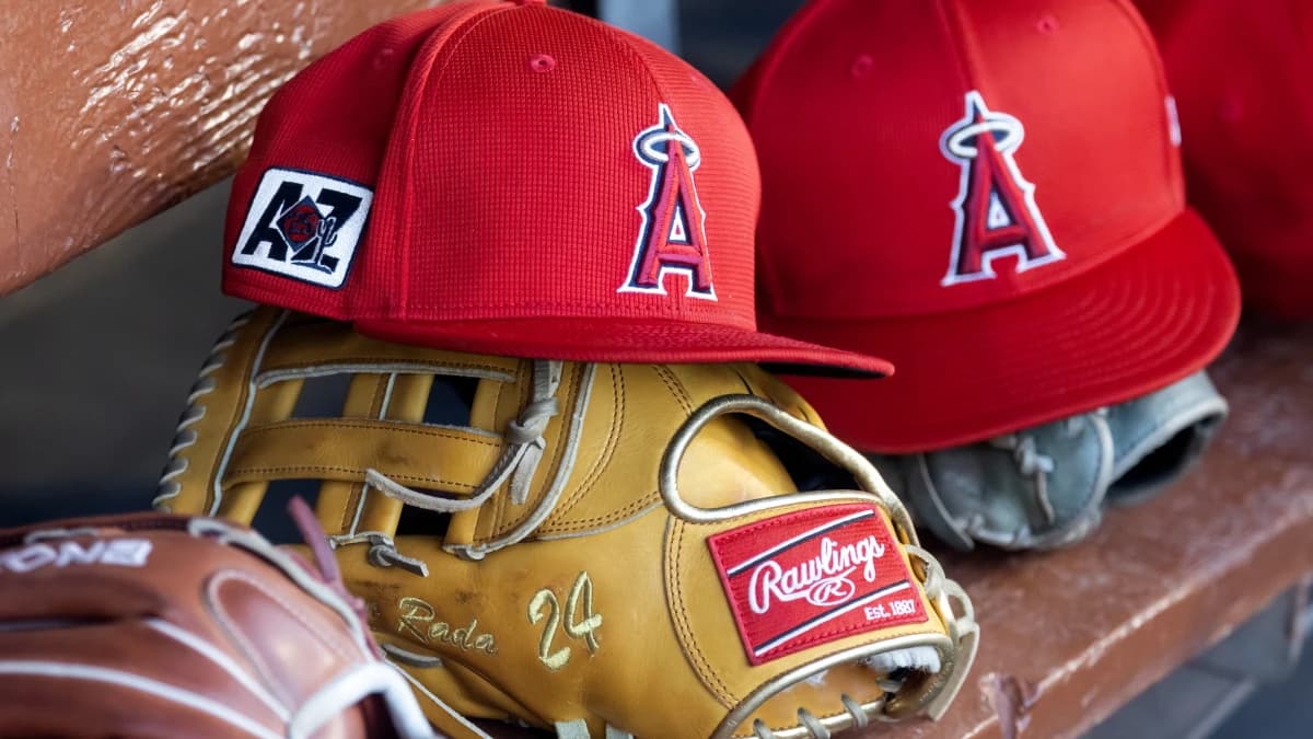 Detailed view of the Los Angeles Angels logo on a hat in the dugout during a spring training game at Camelback Ranch-Glendal
