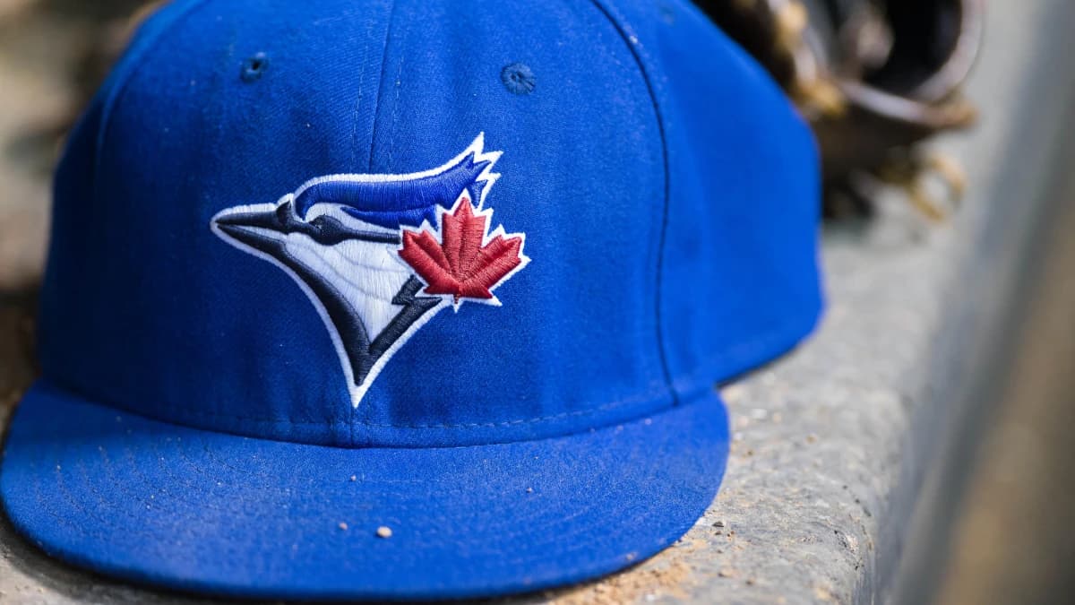 A view of a Toronto Blue Jays ball cap and logo during the game between the Texas Rangers and the Blue Jays at Globe Life Park in Arlington. The Blue Jays shut out the Rangers 2-0