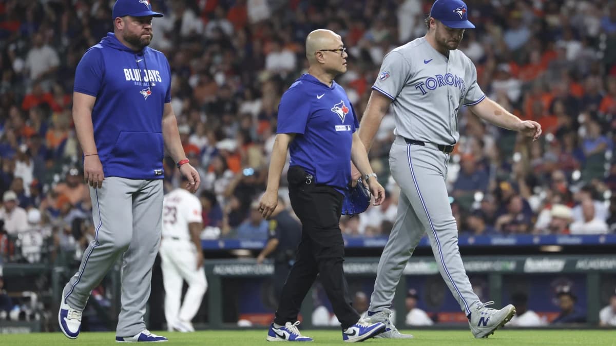 Toronto Blue Jays starting pitcher Trey Yesavage (39) walks off the field after an apparent injury during the third inning against the Houston Astros at Daikin Park.