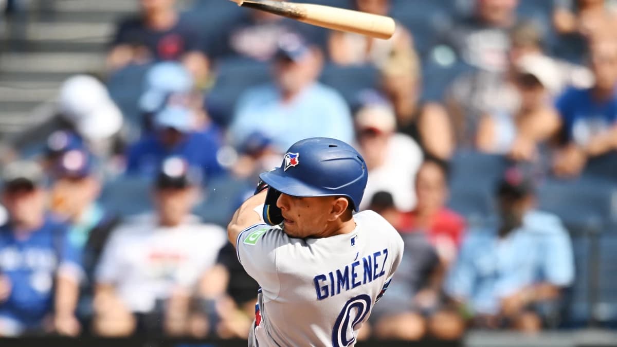 Toronto Blue Jays shortstop Andres Gimenez (0) breaks his bat during the seventh inning against the Cleveland Guardians at Progressive Field.