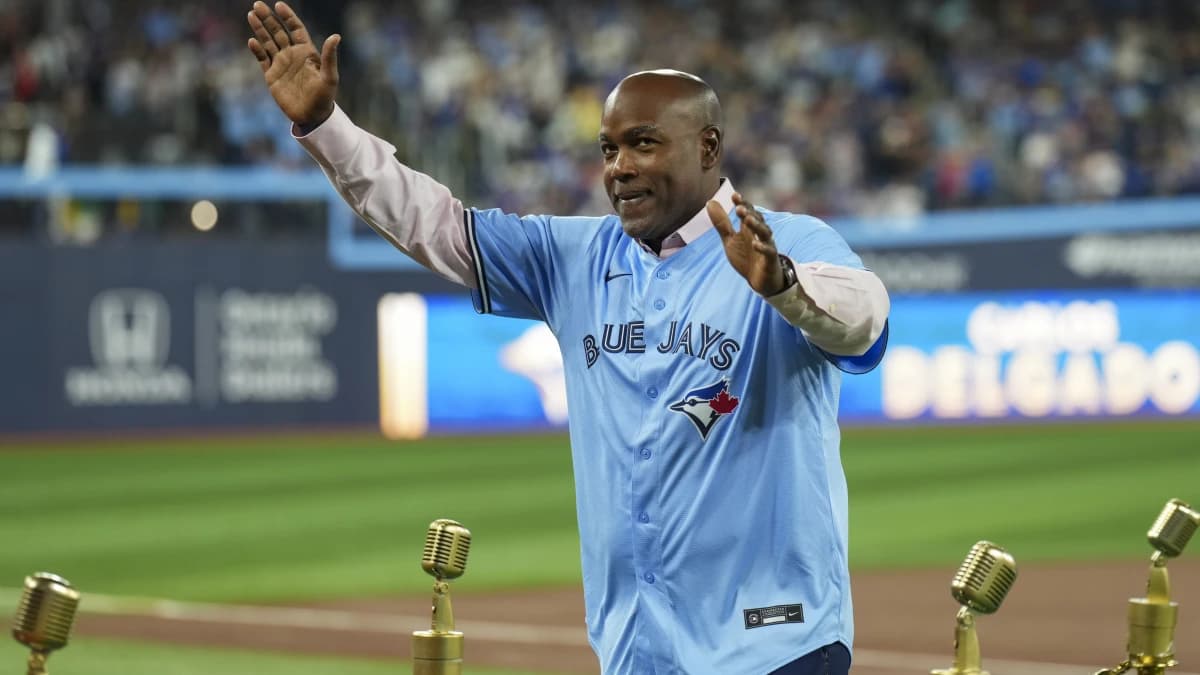 Carlos Delgado former Toronto Blue Jays waves to the fans during a pregame celebration before a game between the Toronto Blue Jays and Seattle Mariners at Rogers Centre.