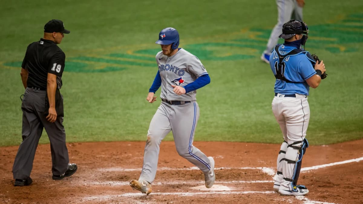 Toronto Blue Jays third baseman Brandon Drury (3) scores during the sixth inning of a game against the Tampa Bay Rays at Tropicana Field