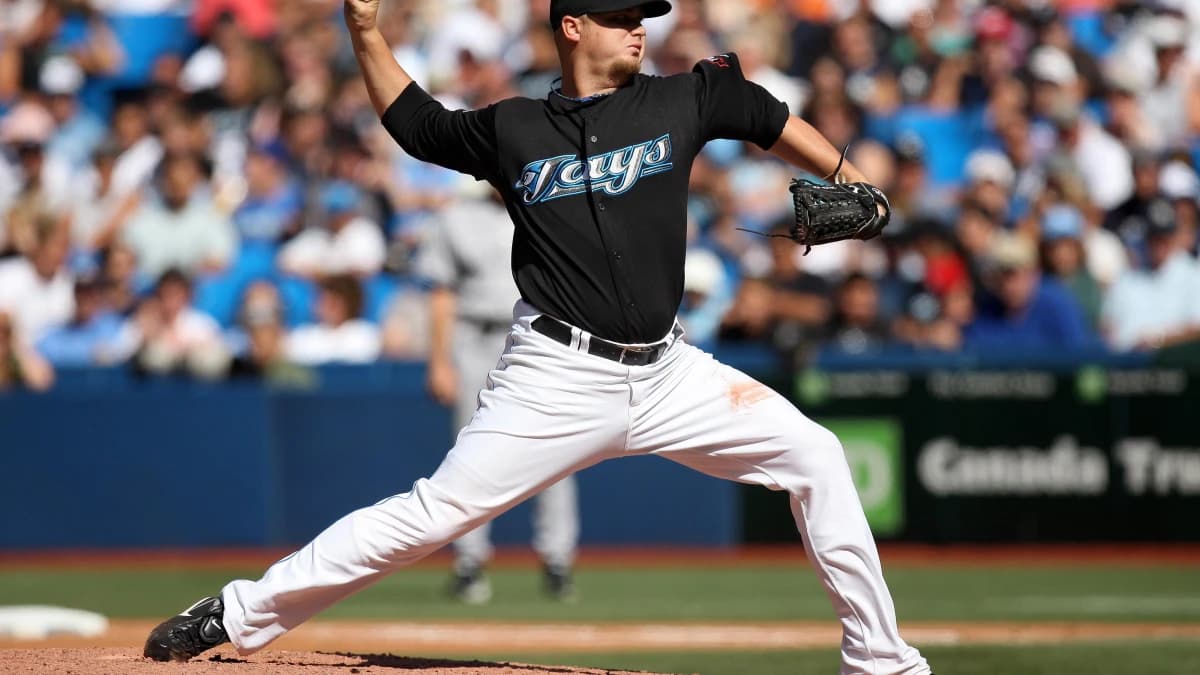 Toronto Blue Jays pitcher Brian Wolfe (40) delivers a pitch against the New York Yankees at the Rogers Centre. The Blue Jays beat the Yankees 14-8.