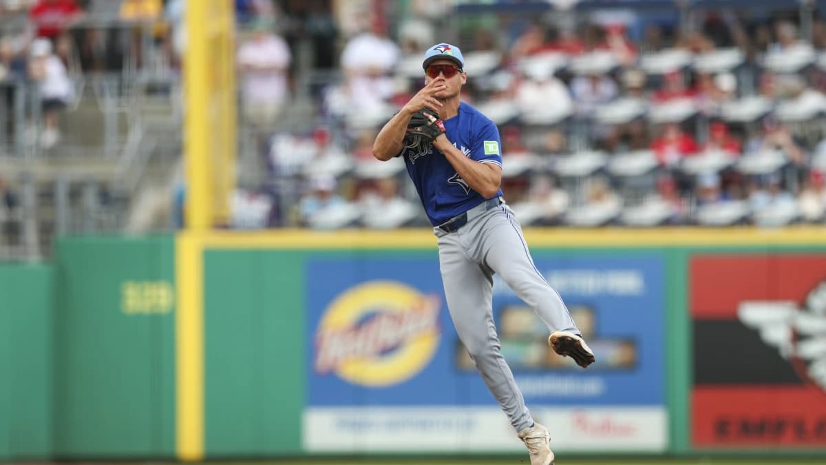 Toronto Blue Jays shortstop Josh Kasevich (86) throws to first for an out against the Philadelphia Phillies in the first inning during spring training at BayCare Ballpark.