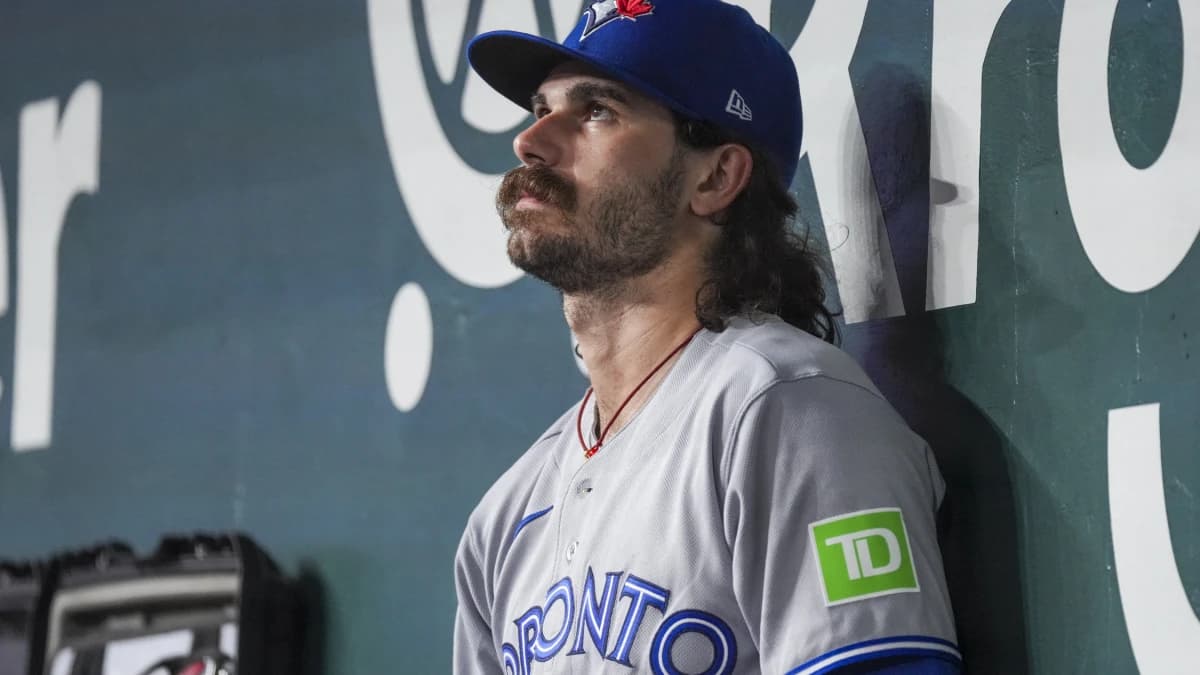 Toronto Blue Jays pitcher Dylan Cease (84) sits in the dugout after being relieved in the third inning after pitching 2 2/3 innings, with six walks and three strike outs against the Texas Rangers at Globe Life Field.
