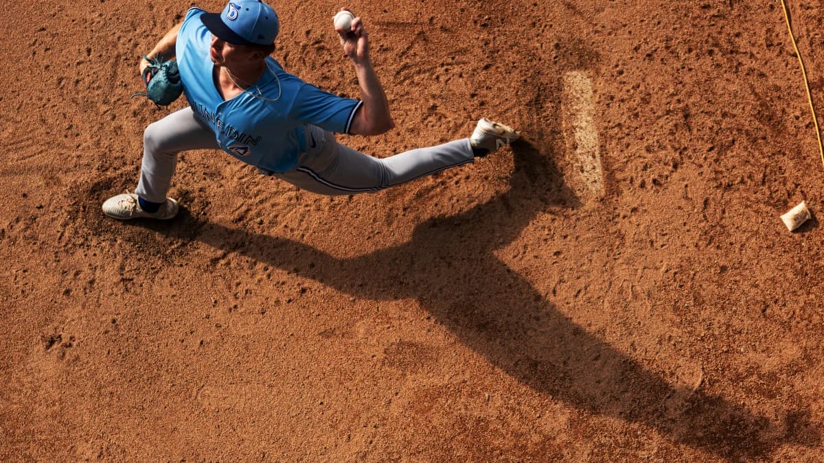 Johnny King, a pitcher for the Dunedin Blue Jays warms up in the bullpen before a game against the Fort Myers Mighty Mussels at Hammond Stadium on Saturday, Aug. 2, 2025. King is a Naples High School alum and two time baseball player of the year.