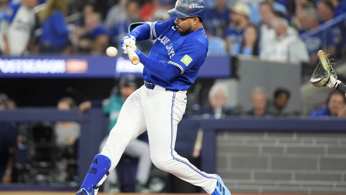 Toronto Blue Jays right fielder Anthony Santander (25) hits a single against the Seattle Mariners in the second inning during game one of the ALCS round for the 2025 MLB playoffs at Rogers Centre.