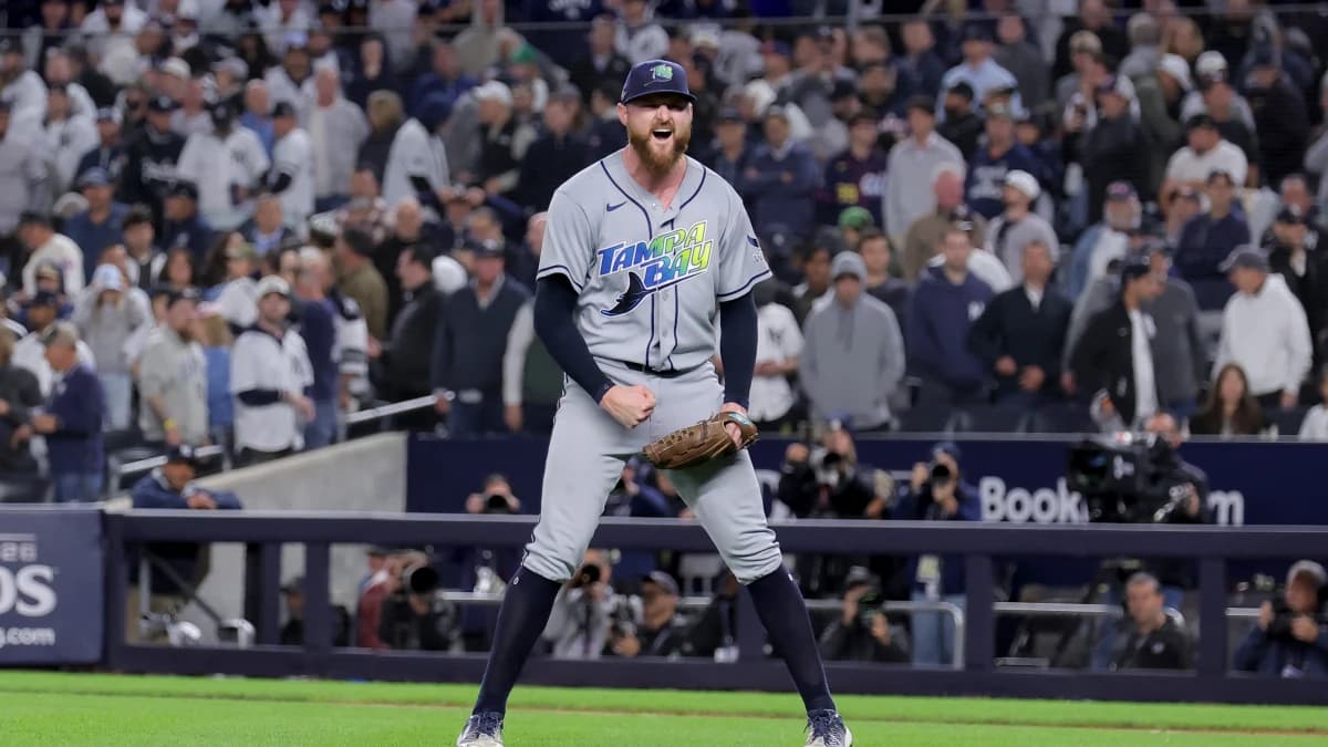Tampa Bay Rays relief pitcher Bryan Baker (47) celebrates after defeating the New York Yankees in game three of the ALDS to win the series 3-0 during the 2026 MLB Playoffs at Yankee Stadium.