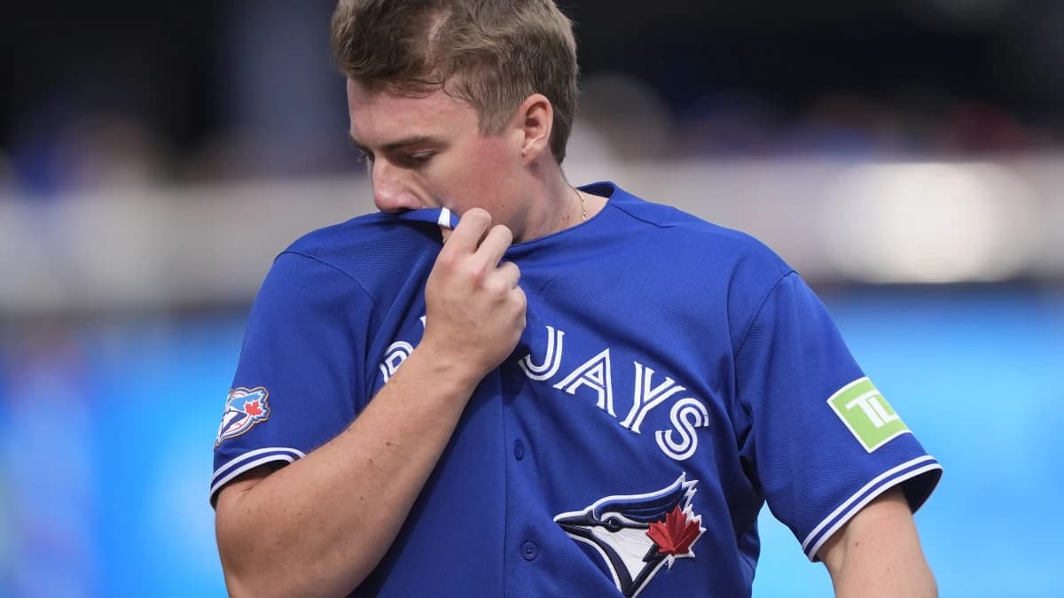 Toronto Blue Jays first baseman Sean Keys (20) comes off the field after being stranded on base against the Cincinnati Reds during the second inning at Rogers Centre.