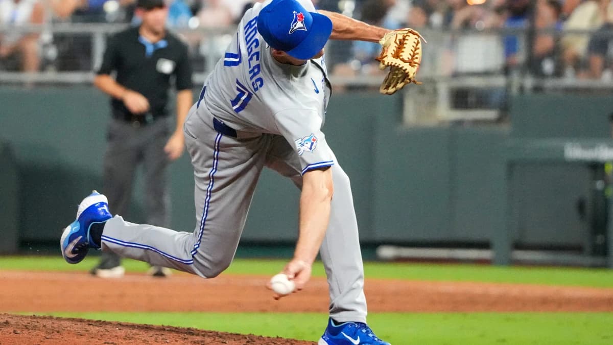 Toronto Blue Jays pitcher Tyler Rogers (71) delivers a pitch against the Kansas City Royals during the eighth inning at Kauffman Stadium.