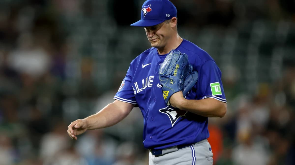 Toronto Blue Jays pitcher Paul Sewald (43) reacts and walks to the dugout after a pitching change against the Athletics during the seventh inning at Sutter Health Park.
