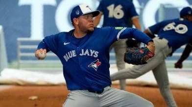 Blue Jays Pitcher Yariel Rodríguez mid-throw