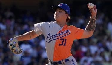 Ricky Tiedemann pitching in the prospects game.