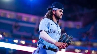 Bo Bichette taking the field at Rogers Centre.