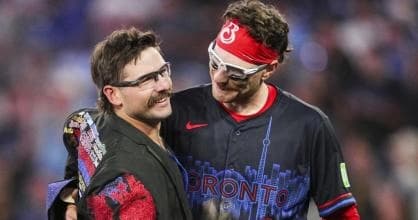 Toronto Blue Jays Davis Schneider and catcher Danny Jansen celebrating a walk off home run. #MLB #BlueJays #Schneider #Jansen