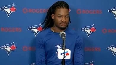 Orelvis Martinez in Blue Jays Spring Training talking to the media.