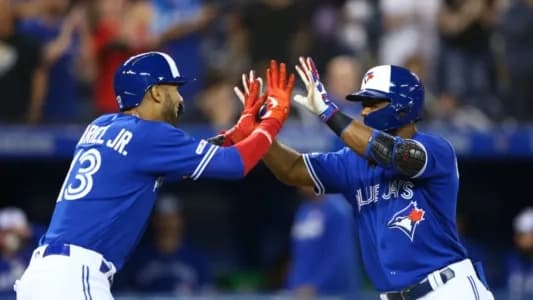 Former Toronto Blue Jays Teoscar Hernandez and Lourdes Gurriel Jr.