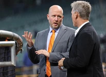 Houston Astros general manger James Click (left) talks with former player Craig Biggio before game one of the ALCS for the 2022 MLB Playoffs against the New York Yankees at Minute Maid Park.