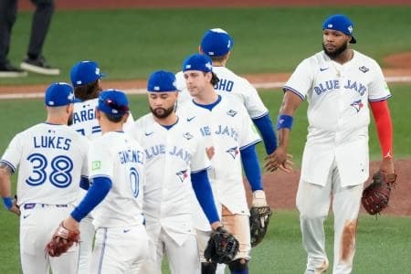 Toronto Blue Jays first baseman Vladimir Guerrero Jr. (27) celebrates after defeating the Los Angeles Dodgers in game one of the 2025 MLB World Series at Rogers Centre.