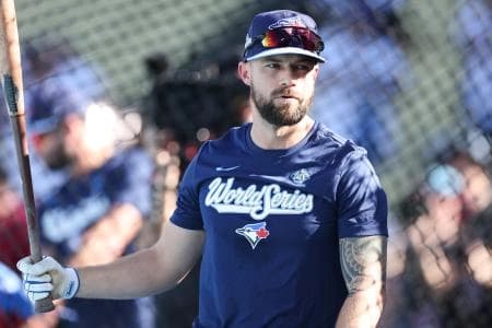 Toronto Blue Jays right fielder Nathan Lukes (38) warms up before the game against the Los Angeles Dodgers during game four of the 2025 MLB World Series at Dodger Stadium.