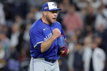 Toronto Blue Jays pitcher Yariel Rodriguez (29) reacts after getting the final out of the sixth inning of game four of the ALDS round of the 2025 MLB playoffs against the New York Yankees at Yankee Stadium.