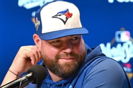 Toronto Blue Jays manager John Schneider (14) speaks to the media prior to game two of the 2025 MLB World Series against the Los Angeles Dodgers at Rogers Centre.