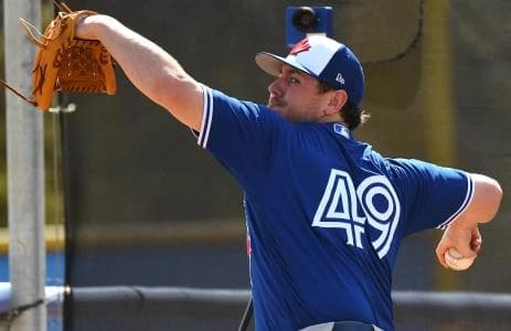 Toronto Blue Jays pitcher Mark Leiter Jr. (49) pitches during spring training at Dunedin Stadium.