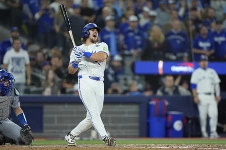 Toronto Blue Jays third baseman Addison Barger (47) reacts after a foul tip in the ninth inning against the Los Angeles Dodgers during game seven of the 2025 MLB World Series at Rogers Centre