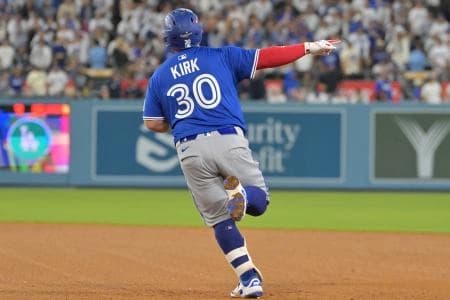 Toronto Blue Jays catcher Alejandro Kirk (30) runs after hitting a three run home run against the Los Angeles Dodgers in the fourth inning during game three of the 2025 MLB World Series at Dodger Stadium.